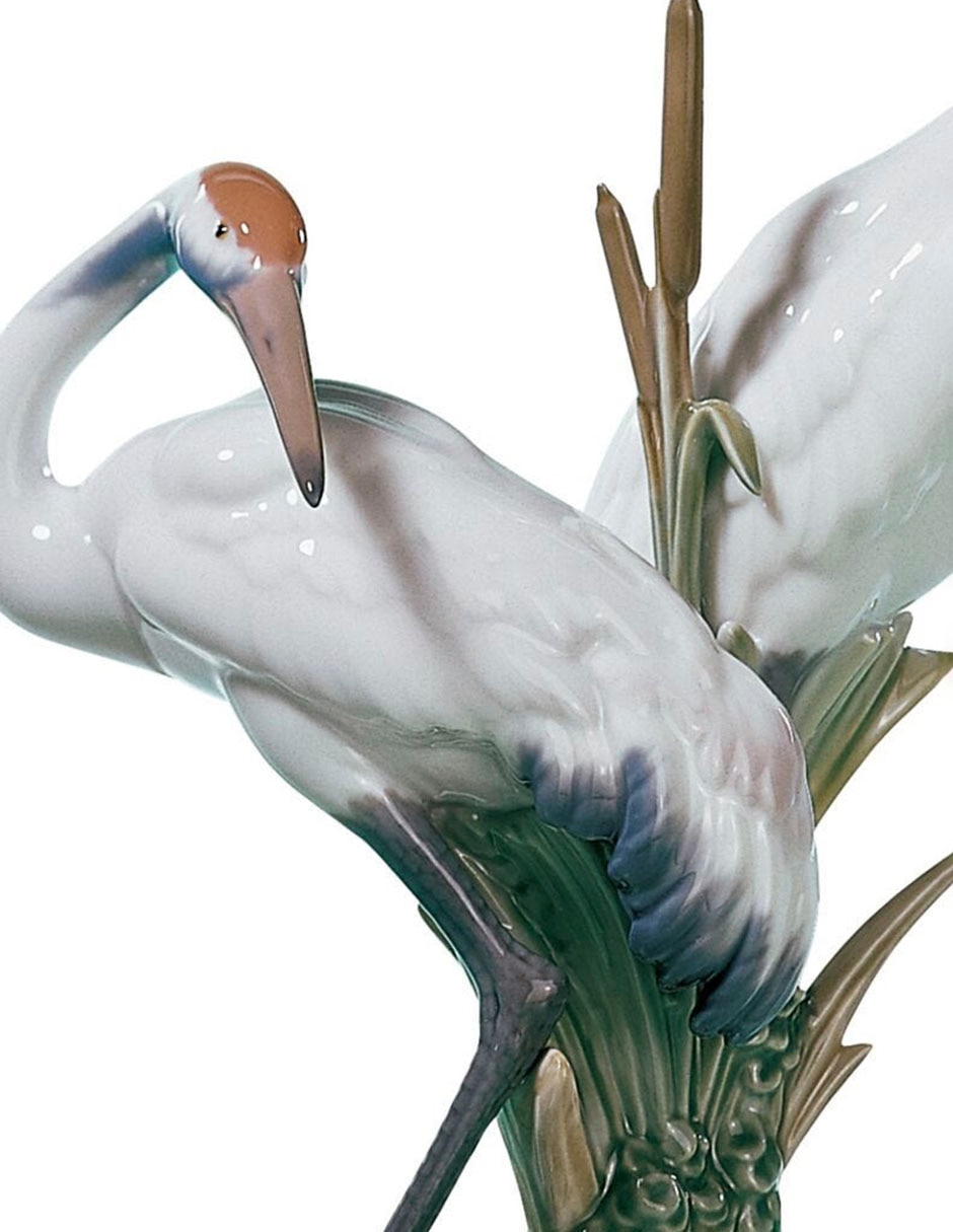 Escultura de Pareja de Grullas Airosas de porcelana